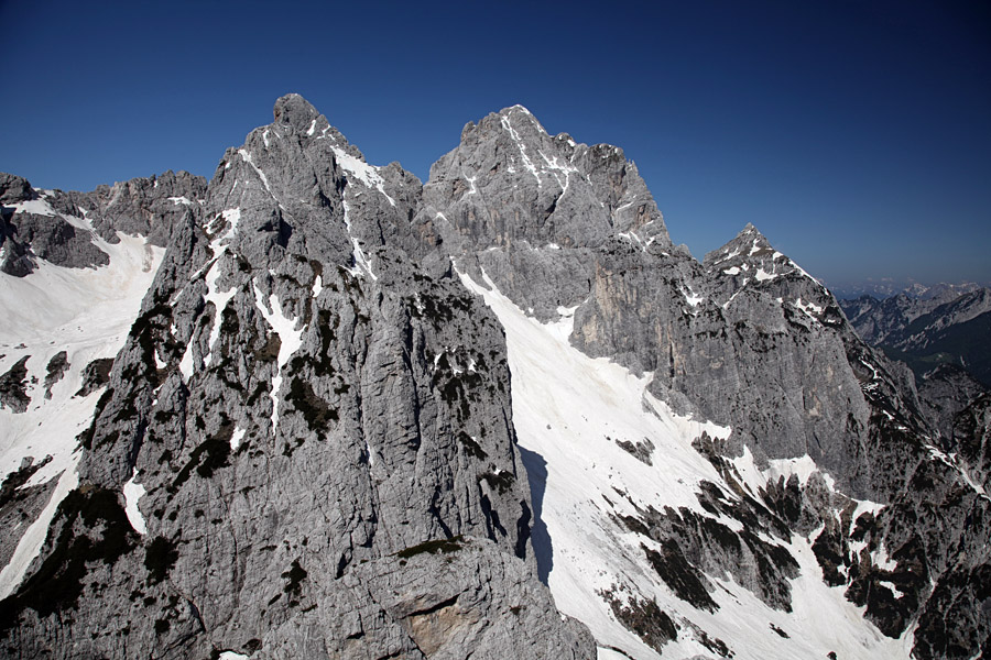 Z Lepe glave
Proti zahodu. Trbiška Krniška špica, Divja koza in Nabojs.
Ključne besede: lepa glava vetta bella trbiška krniška špiva divja koza nabojs